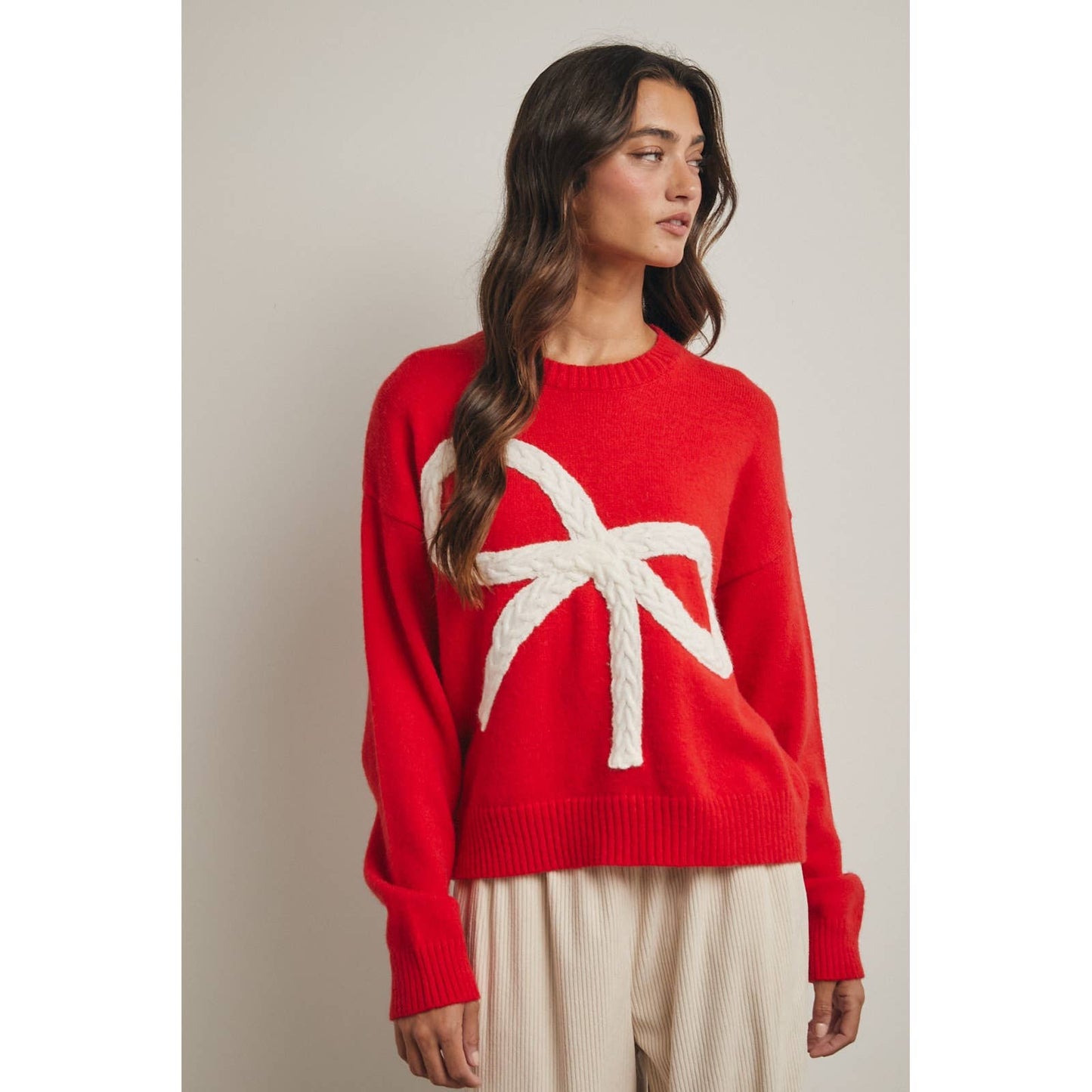 CABLE KNIT BOW SWEATER