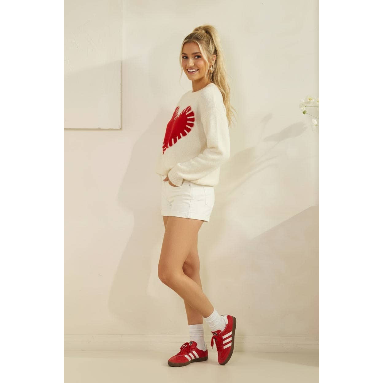 RED HEART KNIT SWEATER
