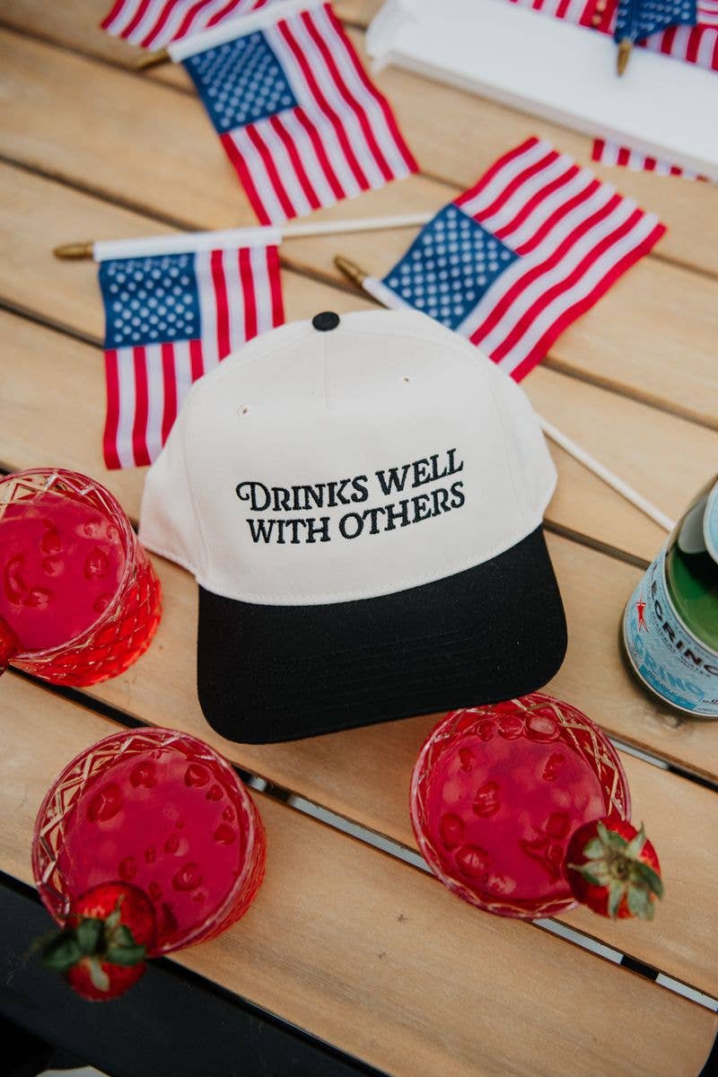 DRINKS WELL WITH OTHERS TRUCKER HAT