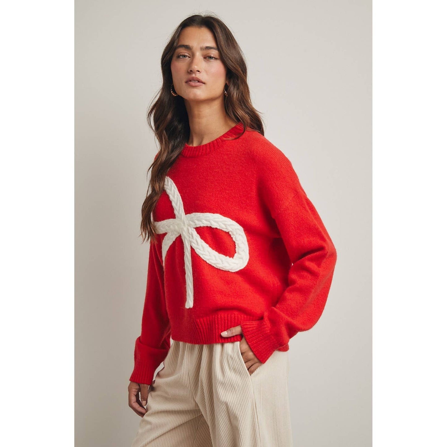 CABLE KNIT BOW SWEATER