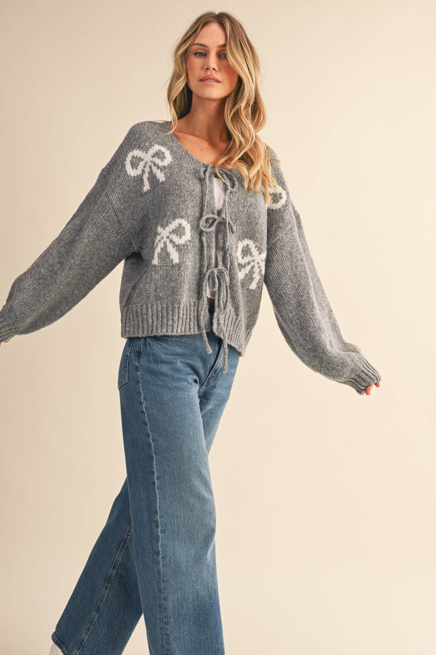 ARI BOW FRONT TIE SWEATER