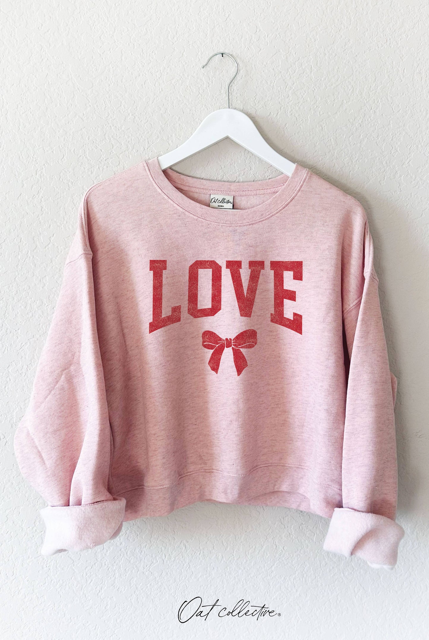 LOVE BOW SWEATSHIRT