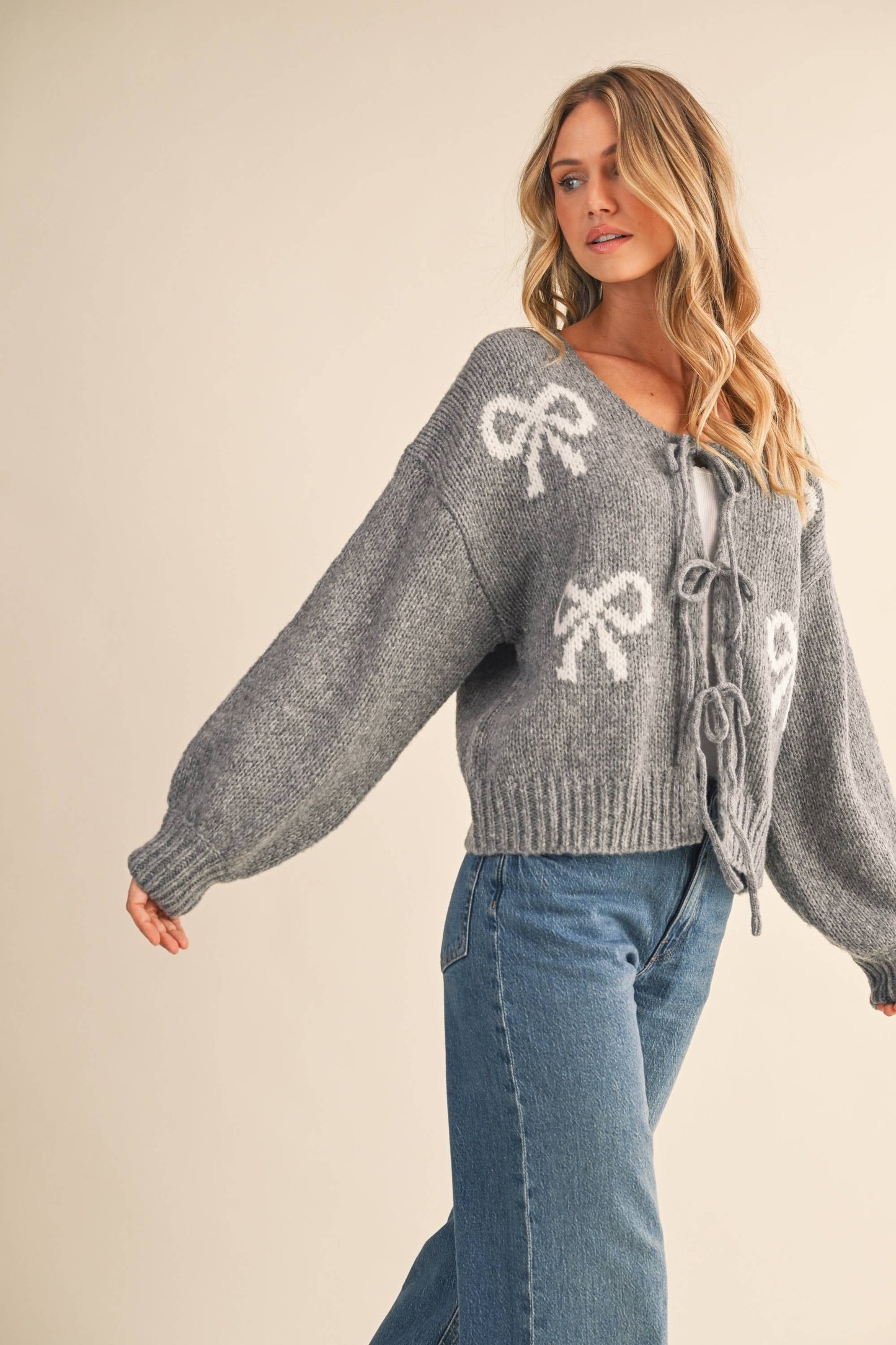 ARI BOW FRONT TIE SWEATER